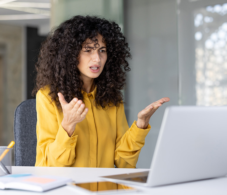 Woman frustrated with website.